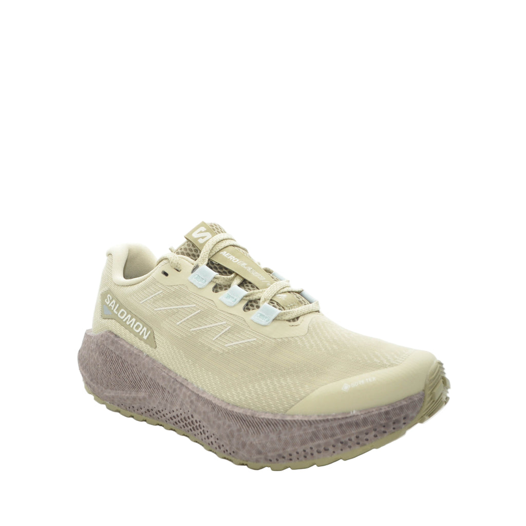 beige salomon walking shoes