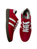 red flat sneakers
