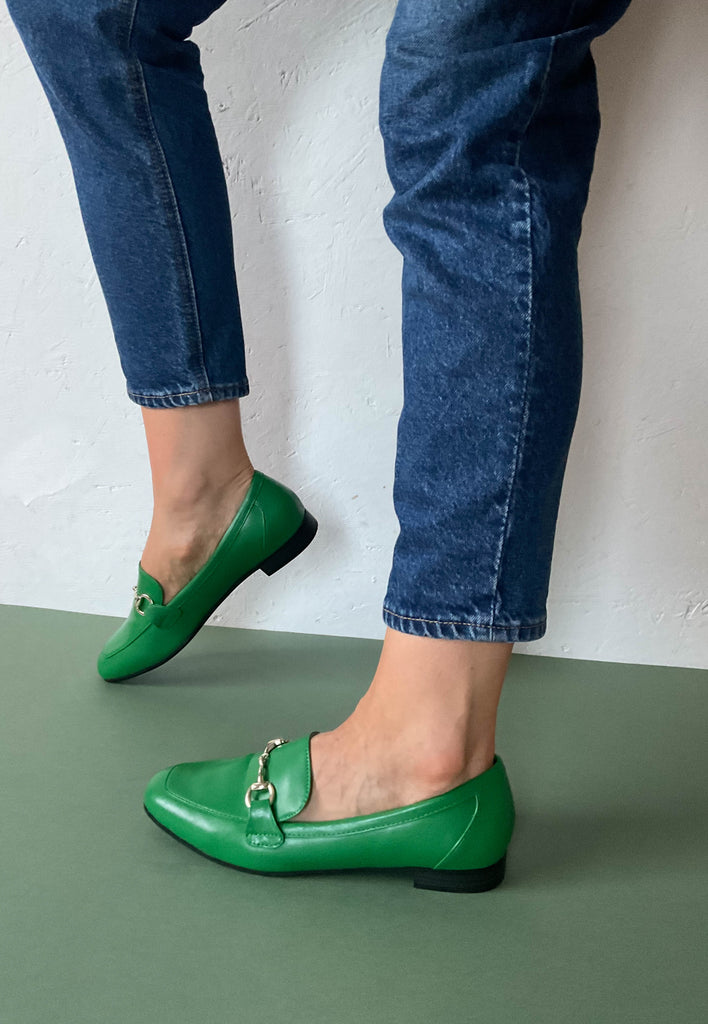 green pump shoes