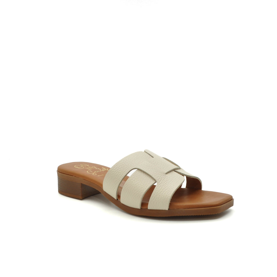 white leather flat sandals
