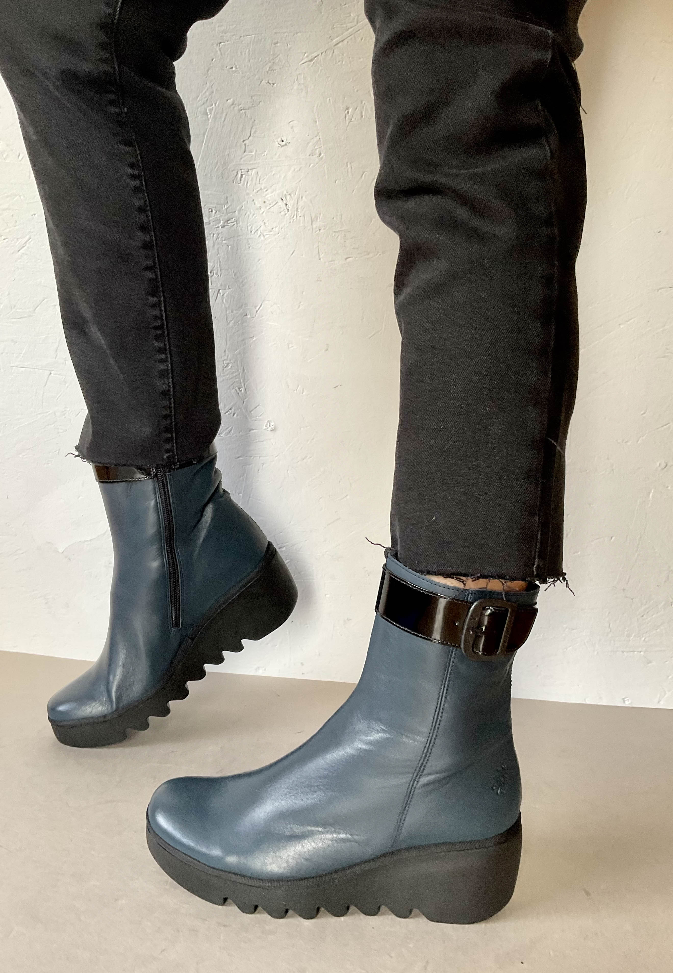 Fly London navy wedge boots