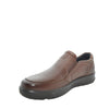 A single brown slip-on leather shoe with a textured pebbled upper and a thick black sole, photographed on a clean white studio background.