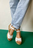 white leather sandals