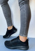 black trainers skechers