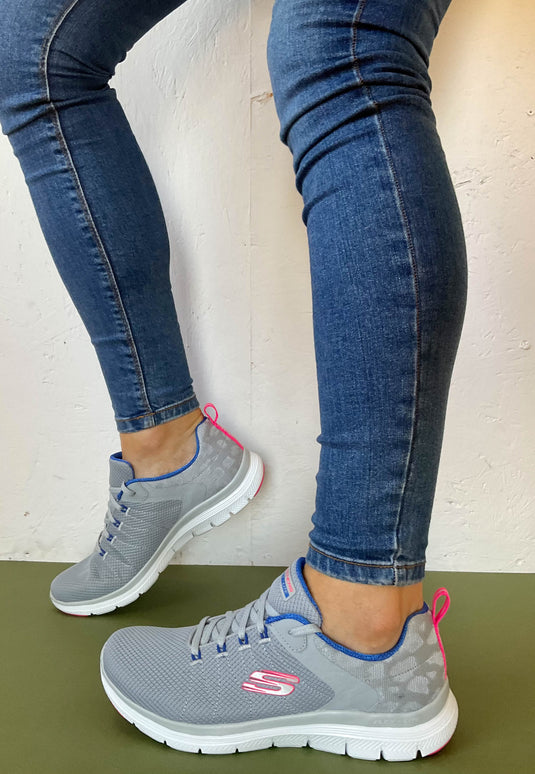 Grey skechers trainers